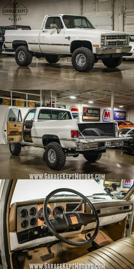 1987 Chevrolet K10 for sale - Engine Stories Vintage white Chevrolet pickup truck with lifted suspension, open door, and classic interior at Garage Kept Motors showroom.