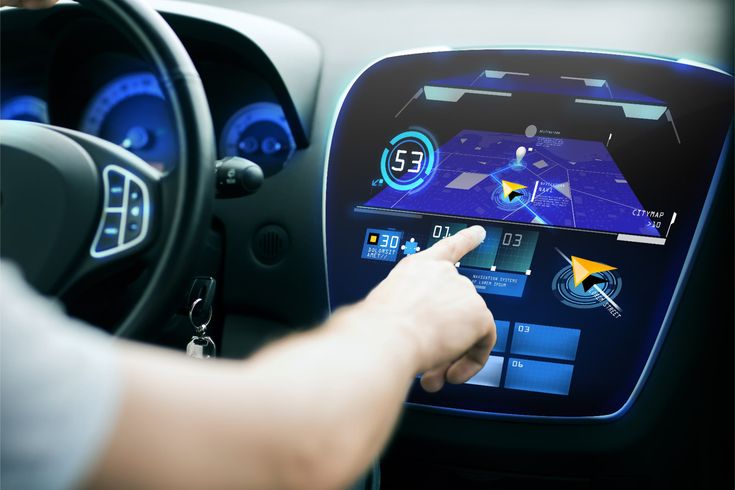 Person using a futuristic car navigation system with digital map display. Advanced automotive technology for seamless driving experience.