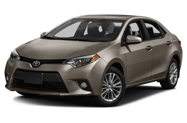 Manual de Propietario TOYOTA Corolla 2016 Descargar PDF Gratis - Engine Stories Toyota Corolla sedan in gray, featuring sleek design and modern headlights, ideal for city driving.