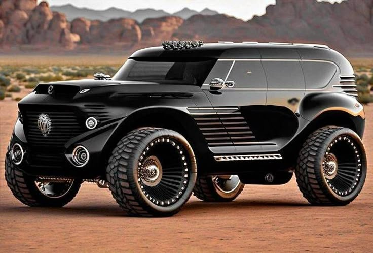 Futuristic black SUV with oversized wheels parked in a desert landscape, showcasing rugged design and innovation.