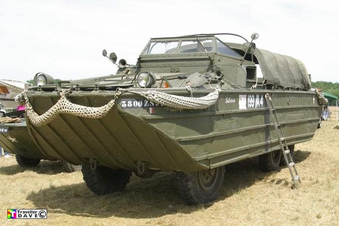 74ddaddc-dbdd-41d0-a137-dbdb03c8099d - Engine Stories World War II amphibious military vehicle on display, showcasing rugged design and historical significance at an outdoor event.