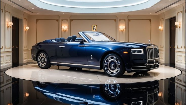 Luxury blue convertible car displayed in an elegant showroom under soft lighting.