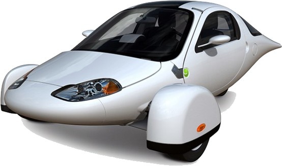 Aptera 2e electric car - Engine Stories Futuristic white three-wheeled electric car with aerodynamic design for efficient urban transportation.