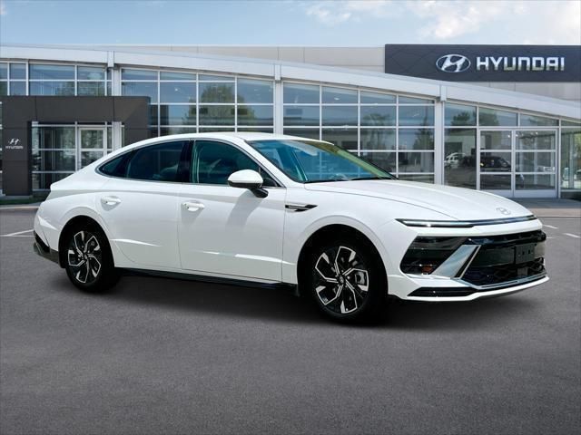 White Hyundai sedan parked in front of a dealership, showcasing its sleek design and modern features.