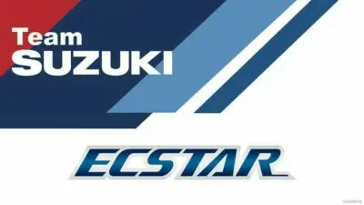 Team Suzuki Ecstar logo featuring bold blue and red geometric design elements for motorsport branding.