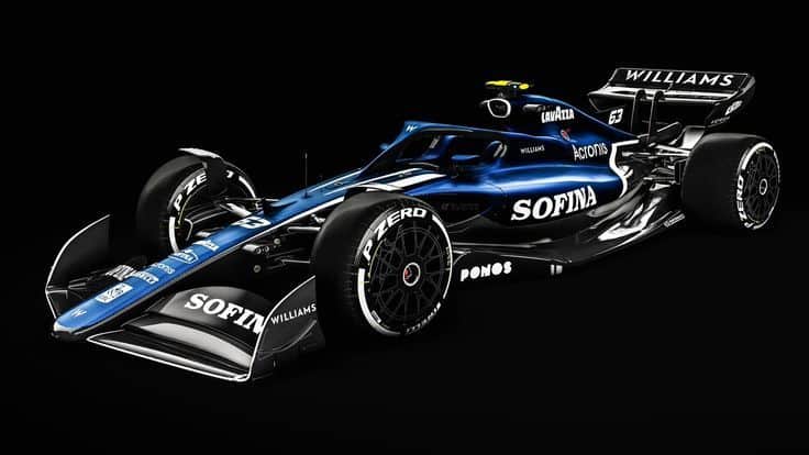 Dark blue Williams F1 car on a black background, showcasing sleek design and prominent sponsor logos.