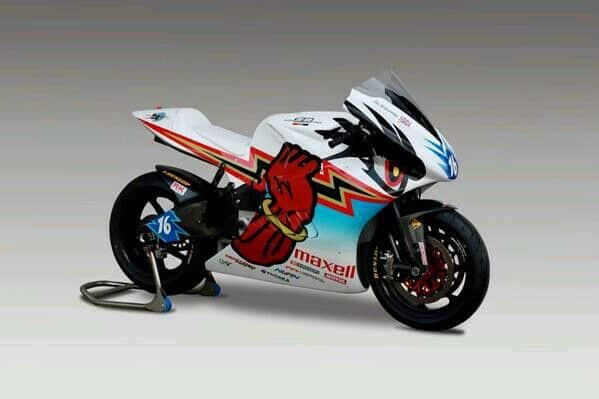 Sportbike with dynamic graphics and sleek design, featuring bold lightning bolt and red accents, on a motorcycle stand.
