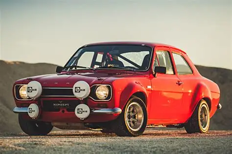 Classic red vintage car in a desert landscape, enhanced with rally-style lights and retro wheels.
