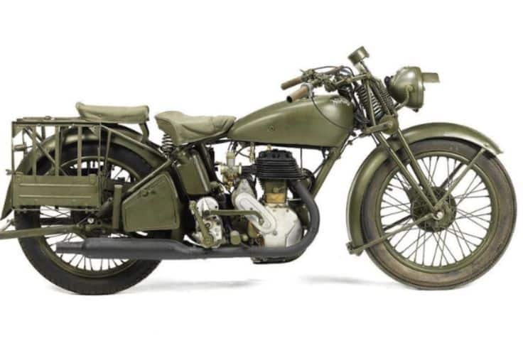 Vintage military motorcycle, olive green, side view, showcasing classic design and sturdy build.