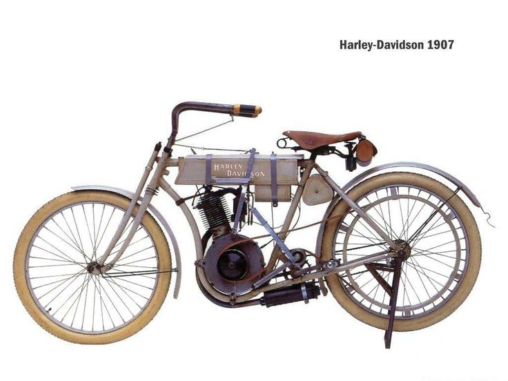 1907 vintage Harley-Davidson motorcycle with an antique design, featuring a leather seat and early engine technology.